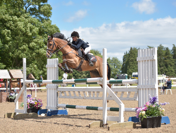 Claudia Moore wins The Stable Company HOYS 138cms Qualifier at Bicton Arena